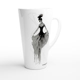 A white ceramic latte mug featuring a black and gray artistic illustration of a woman in a flowing dress, shown on a clean white background.