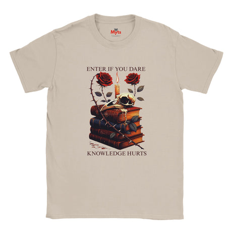 Natural t-shirt with a graphic design of books, roses, and candles on a white background.