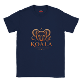 A navy blue short-sleeve t-shirt with a graphic print of a koala face and the text 'KOALA MY TREE MY HOME' in orange and brown tones, displayed on a clean white background.