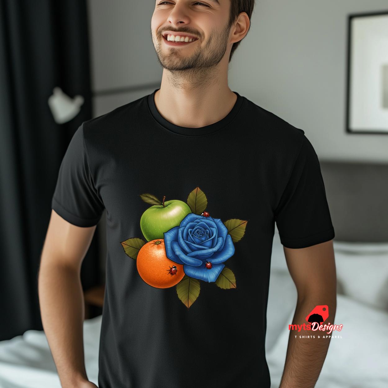 Man wearing a black t-shirt with a colorful design of an apple, orange, and blue rose.