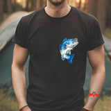 Person wearing a black t-shirt with a blue fish graphic, standing outdoors.