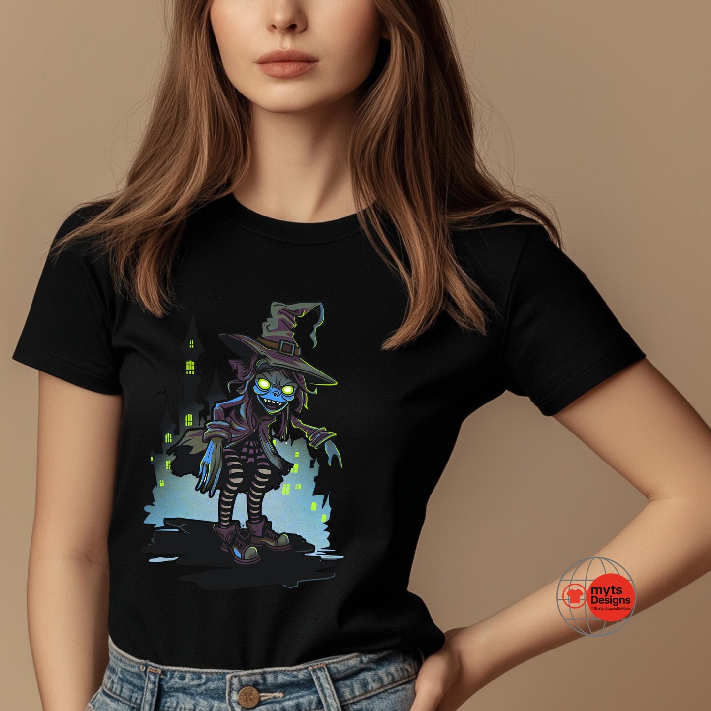 Person wearing a black t-shirt with a graphic design of a creature on a beige background