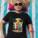 Person wearing a black t-shirt with a beach-themed design, lying on a striped towel.