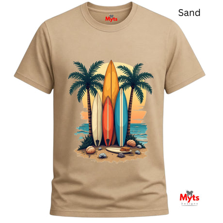 Sand t-shirt with a tropical design featuring surfboards and palm trees on a white background.