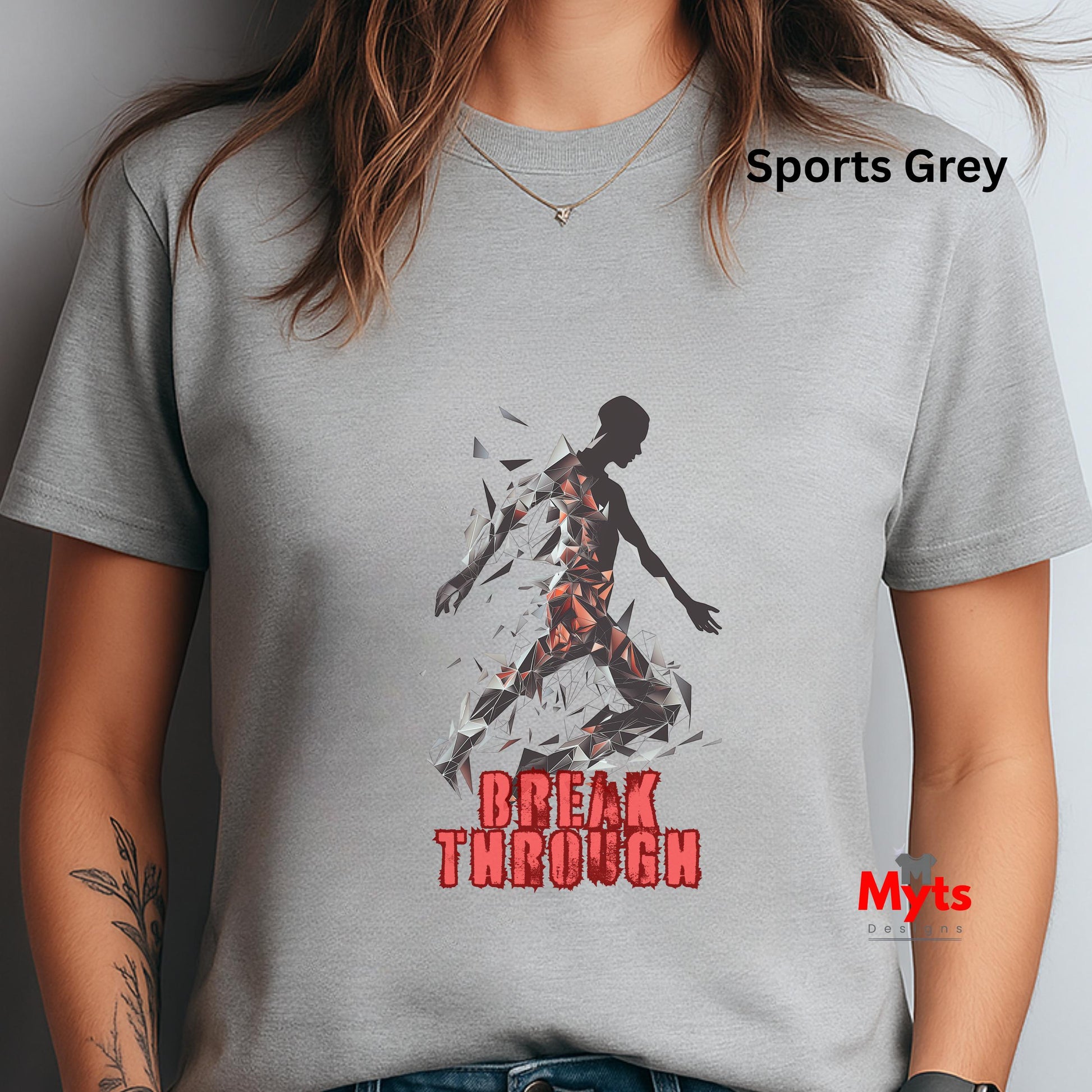 Gray t-shirt with a graphic design and text 'Break Through' on a plain background
