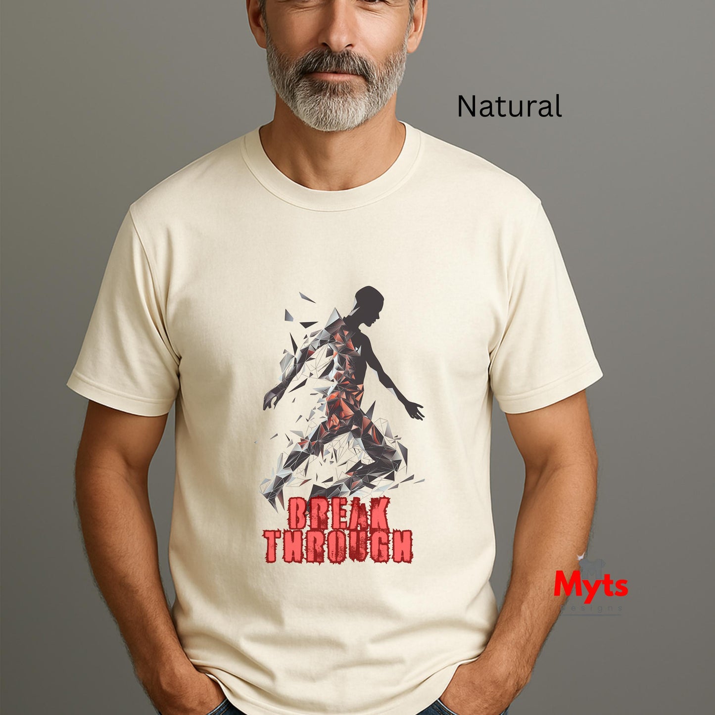 Man wearing a t-shirt with a graphic design and text on a gray background