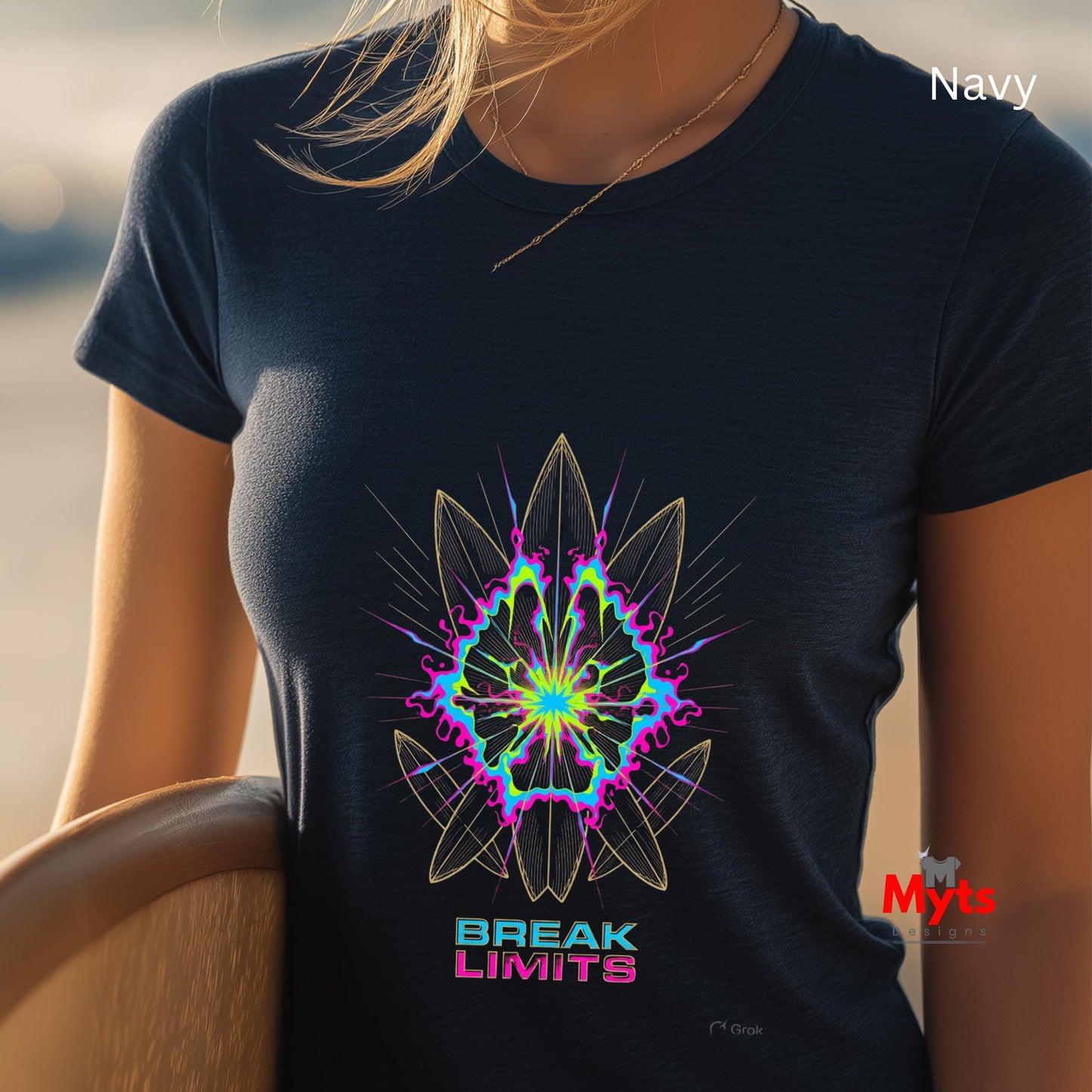 Navy t-shirt with a colorful geometric design and 'Break Limits' text, worn by a person.