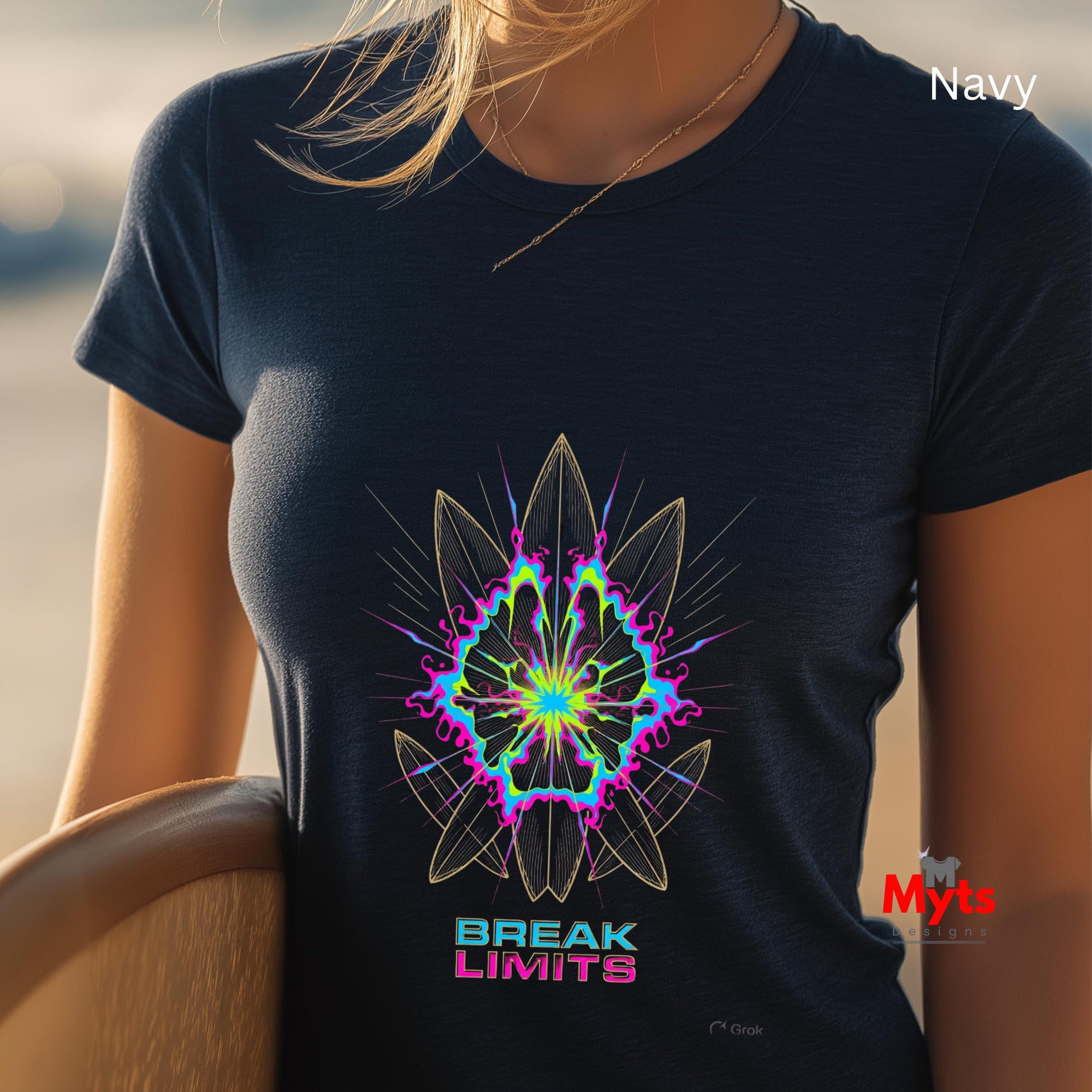 Navy t-shirt with a colorful geometric design and 'Break Limits' text, worn by a person.