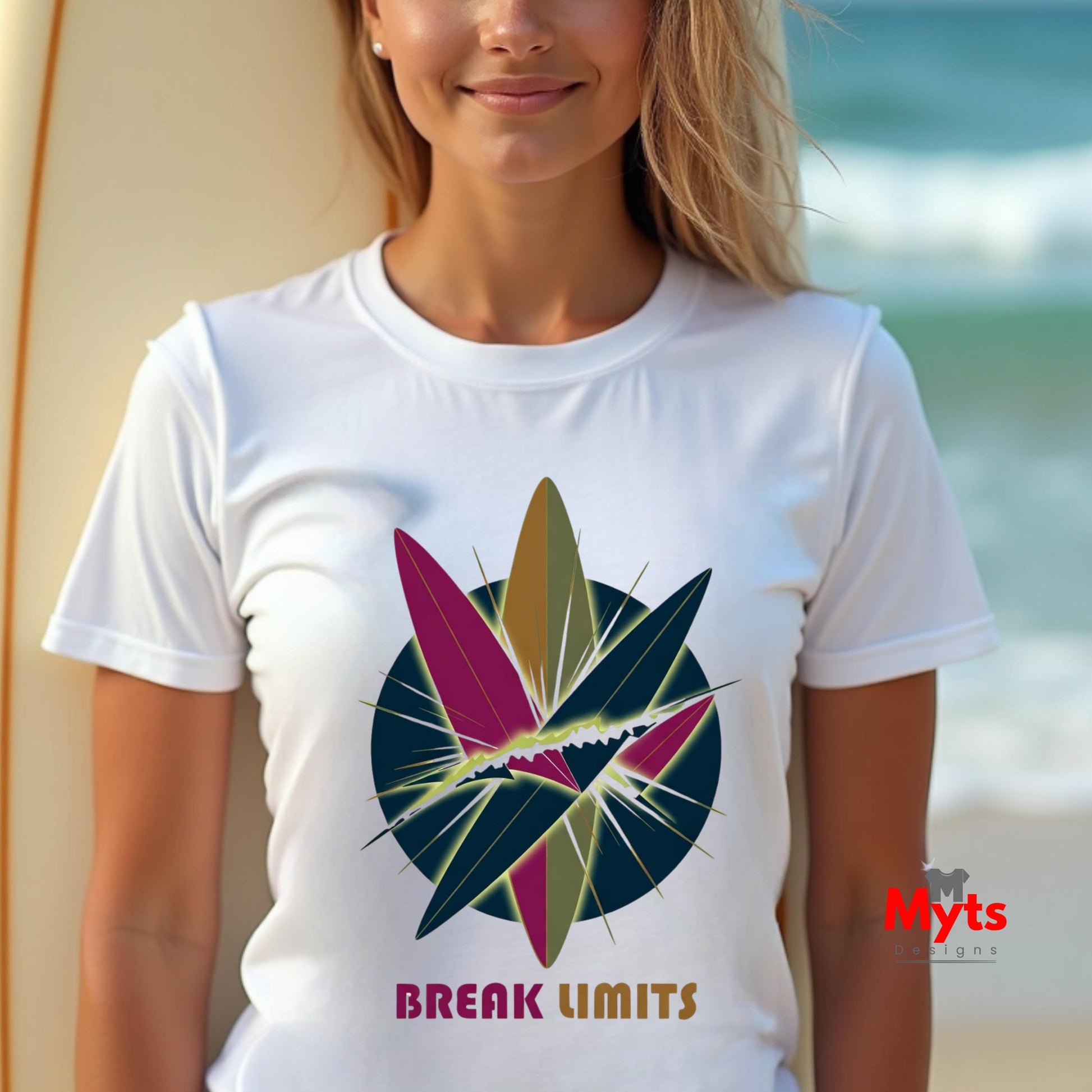 Person wearing a white t-shirt with a colorful leaf design and 'Break Limits' text on a beach.