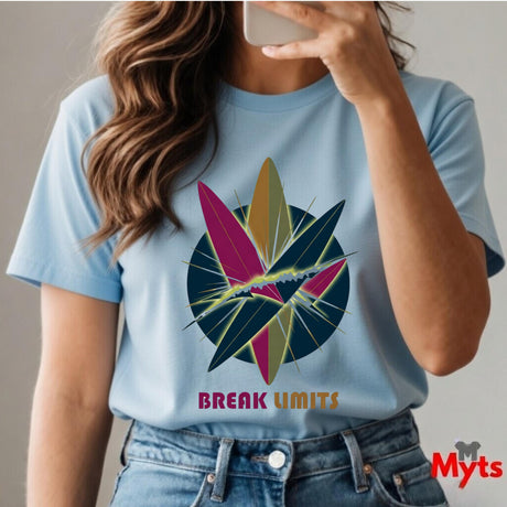 Person wearing a light blue t-shirt with a colorful graphic and 'Break Limits' text, taking a selfie.