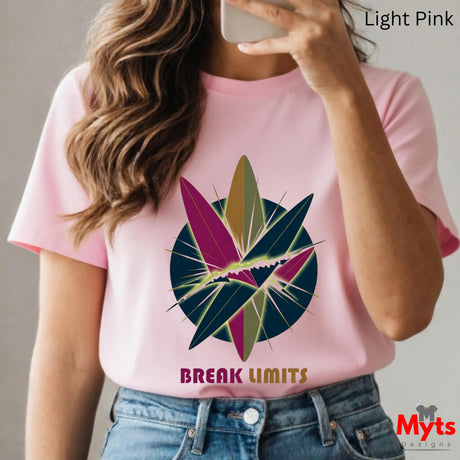 Person wearing a pink t-shirt with a colorful design and 'Break Limits' text, taking a selfie.