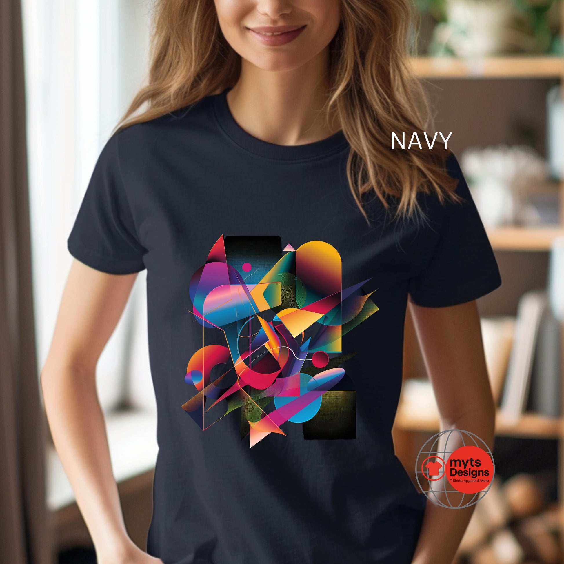 Person wearing a navy t-shirt with a colorful abstract design, brand 'myts Designs' visible.