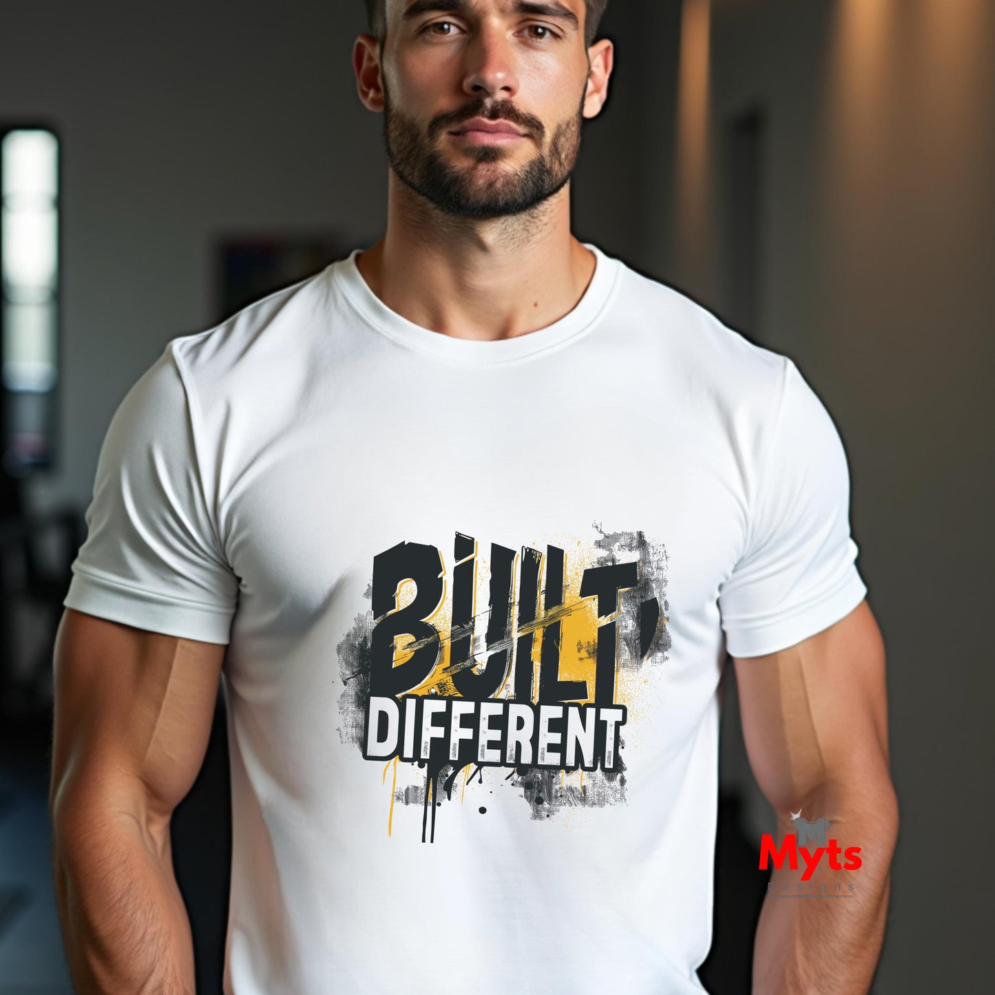 Man wearing a white t-shirt with 'Built Different' text and logo.