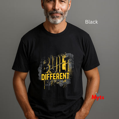 Man wearing a black t-shirt with 'Build Different' text on a gray background