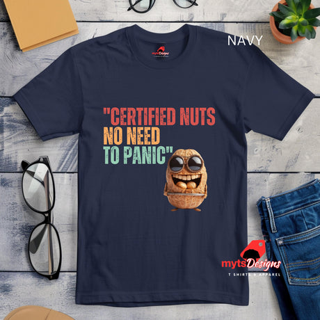 Flat Lay view, Retro-style casual tee featuring bold vintage script reading “Certified Nuts, No Need to Panic” in distressed lettering, printed on a navy ultra-soft Gildan 64000 cotton.

