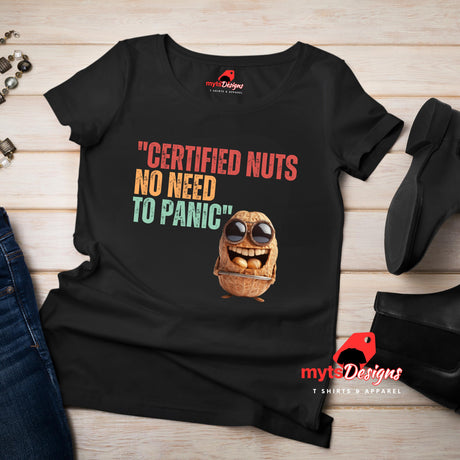 A flat lay vie of a black Retro-style casual tee featuring bold vintage script reading “Certified Nuts, No Need to Panic” in distressed lettering, printed on ultra-soft Gildan 64000 cotton.

