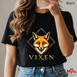 Person wearing a black t-shirt with a fox graphic and 'Vixen' text, holding a phone.