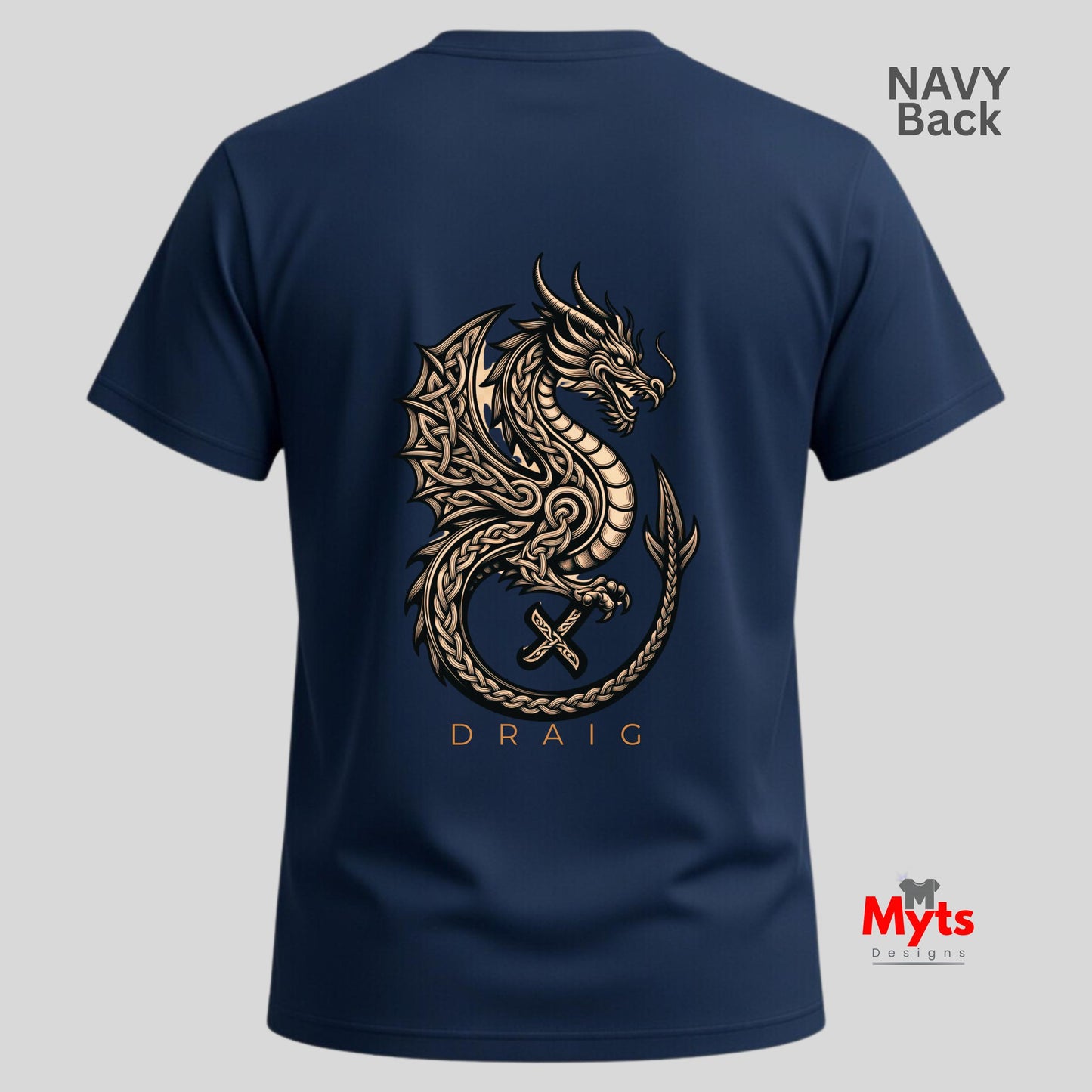 Back view of a navy blue t-shirt featuring a large gold Celtic dragon graphic with the name 'DRAIG' underneath, shown on a light gray background with 'NAVY Back' text in the top right and a 'Myts Designs' logo in the bottom right.