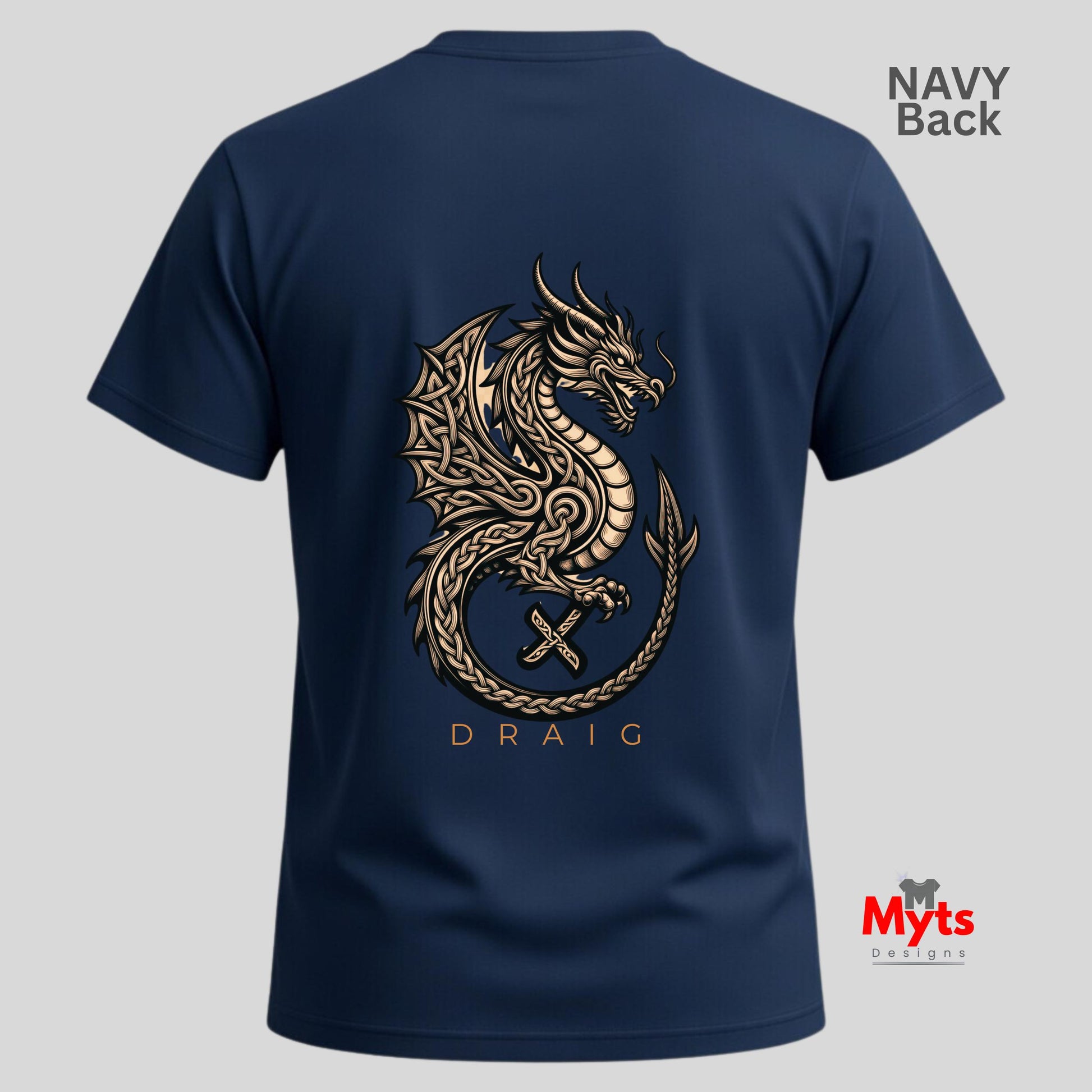 Back view of a navy blue t-shirt featuring a large gold Celtic dragon graphic with the name 'DRAIG' underneath, shown on a light gray background with 'NAVY Back' text in the top right and a 'Myts Designs' logo in the bottom right.
