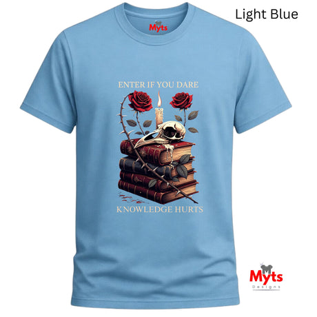 Light blue t-shirt with skull, books, and roses design on a white background