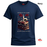 Navy blue t-shirt with skull, books, and roses design on a white background