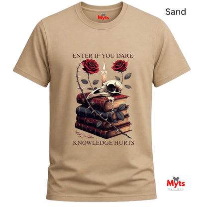 Sand t-shirt with skull, books, and roses graphic design on a white background
