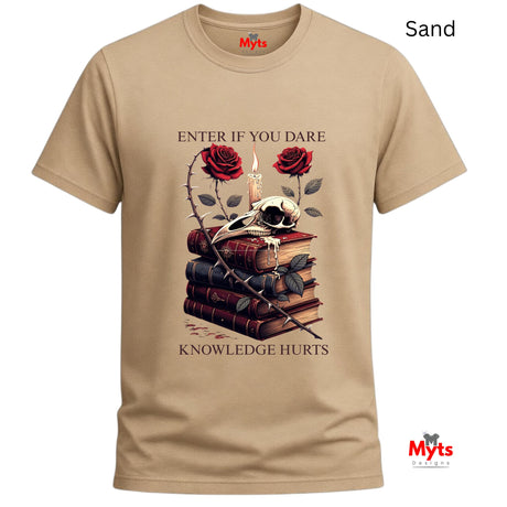 Sand t-shirt with skull, books, and roses graphic design on a white background