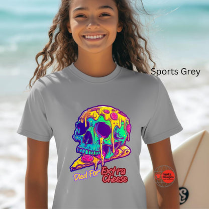 Child wearing a gray t-shirt with a colorful pizza skull design on a beach.