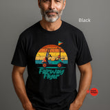 Man wearing a black t-shirt with 'Fairway Flyer' graphic design on a gray background