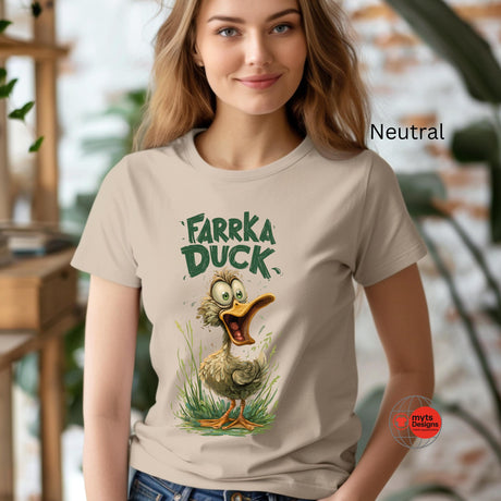 Woman wearing a t-shirt with 'Farka Duck' graphic design in an indoor setting.
