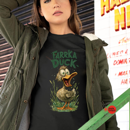 Person wearing a black t-shirt with a cartoon duck graphic and text, standing in front of a colorful wall.