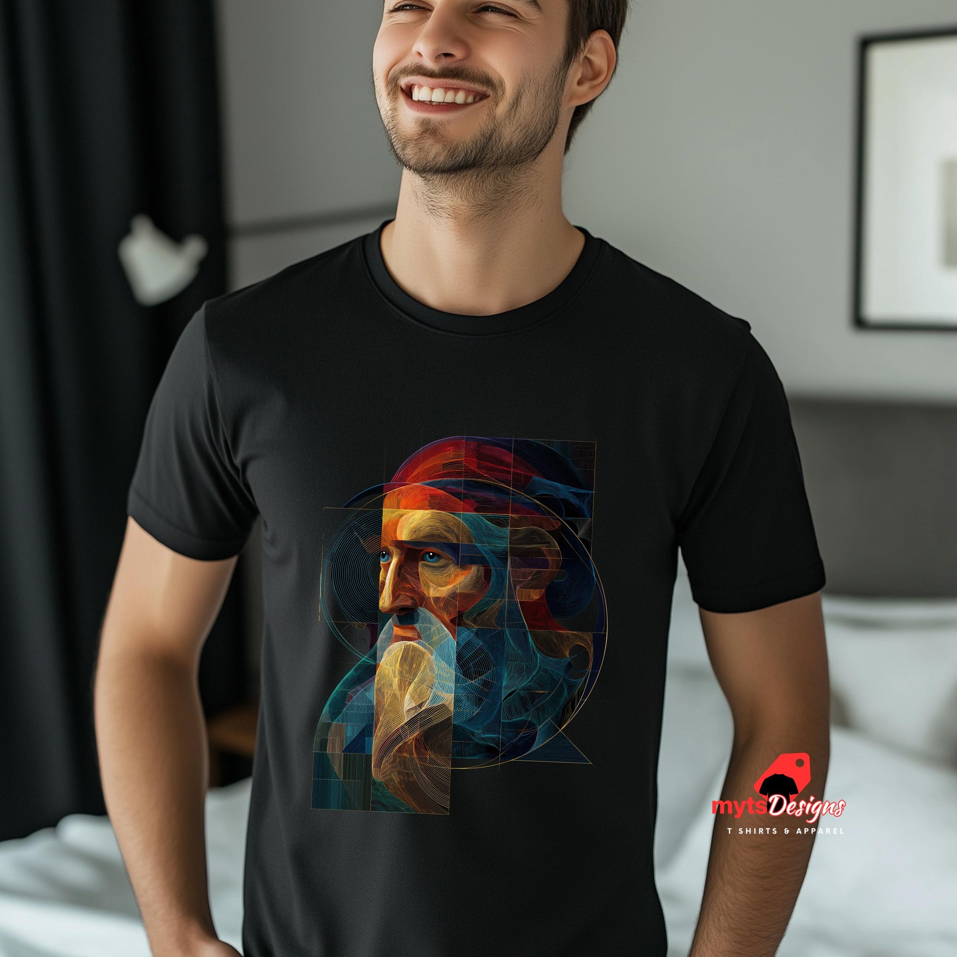 Man wearing a black t-shirt with a colorful graphic design, standing in a room.