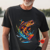 Man wearing a black t-shirt with a colorful fish design outdoors.