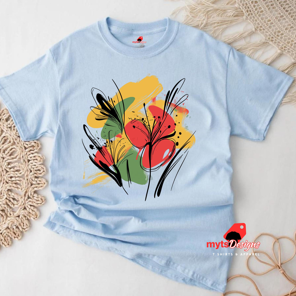 Light BlueT-shirt with bold abstract floral design featuring red blooms, yellow and green brushstrokes, and black line art accents, from MytsDesigns.com