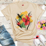 Natural T-shirt with bold abstract floral design featuring red blooms, yellow and green brushstrokes, and black line art accents, from MytsDesigns.com