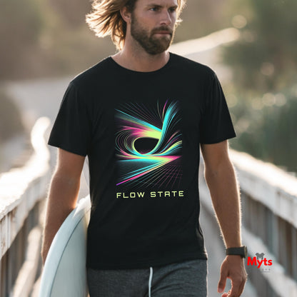 Man wearing a black t-shirt with colorful design and 'Flow State' text, holding a surfboard on a bridge.