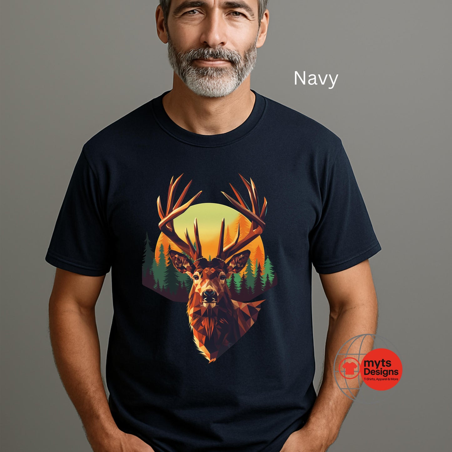 Man wearing a navy t-shirt with a deer graphic design on a gray background