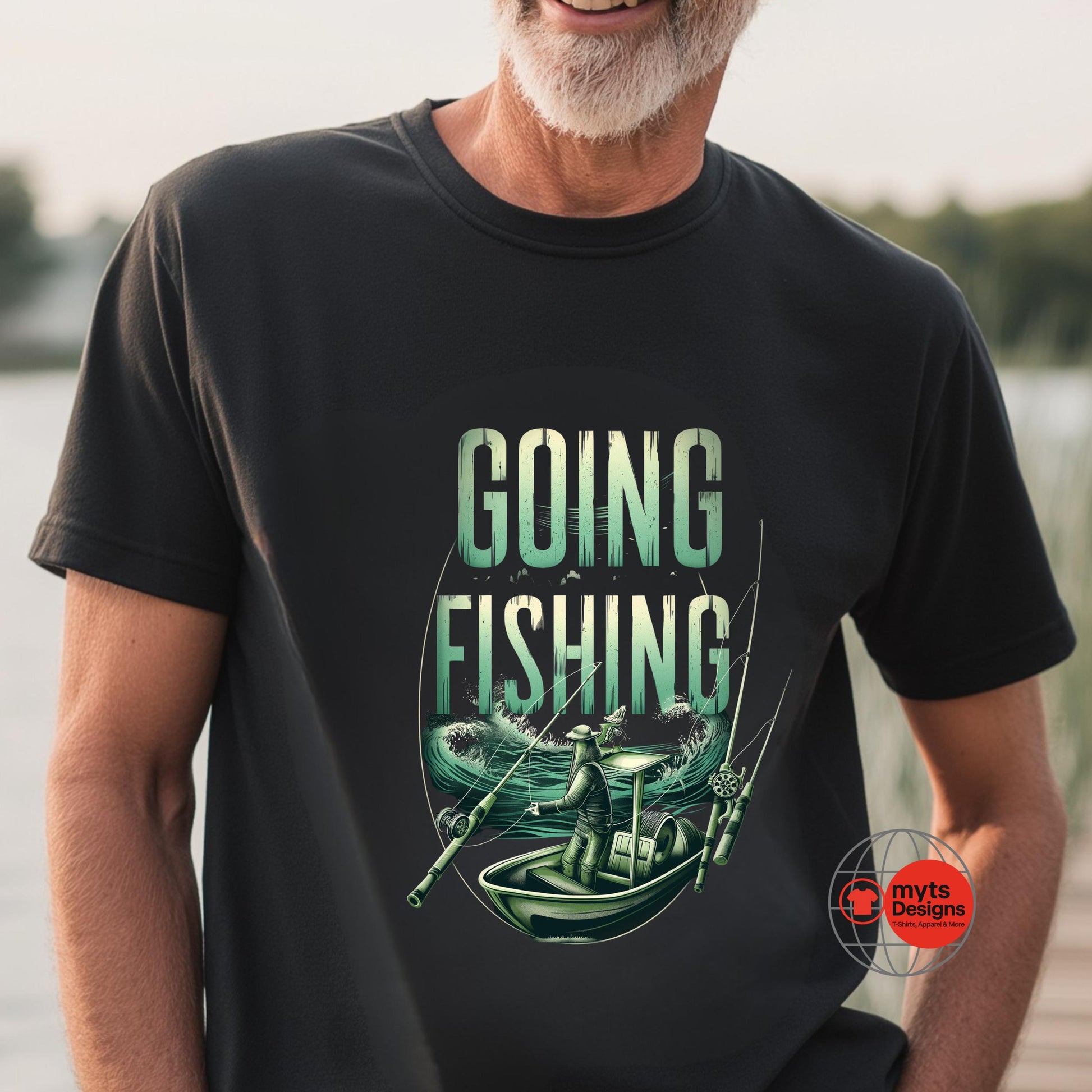 Man wearing a black t-shirt with 'Going Fishing' graphic design by a lake.
