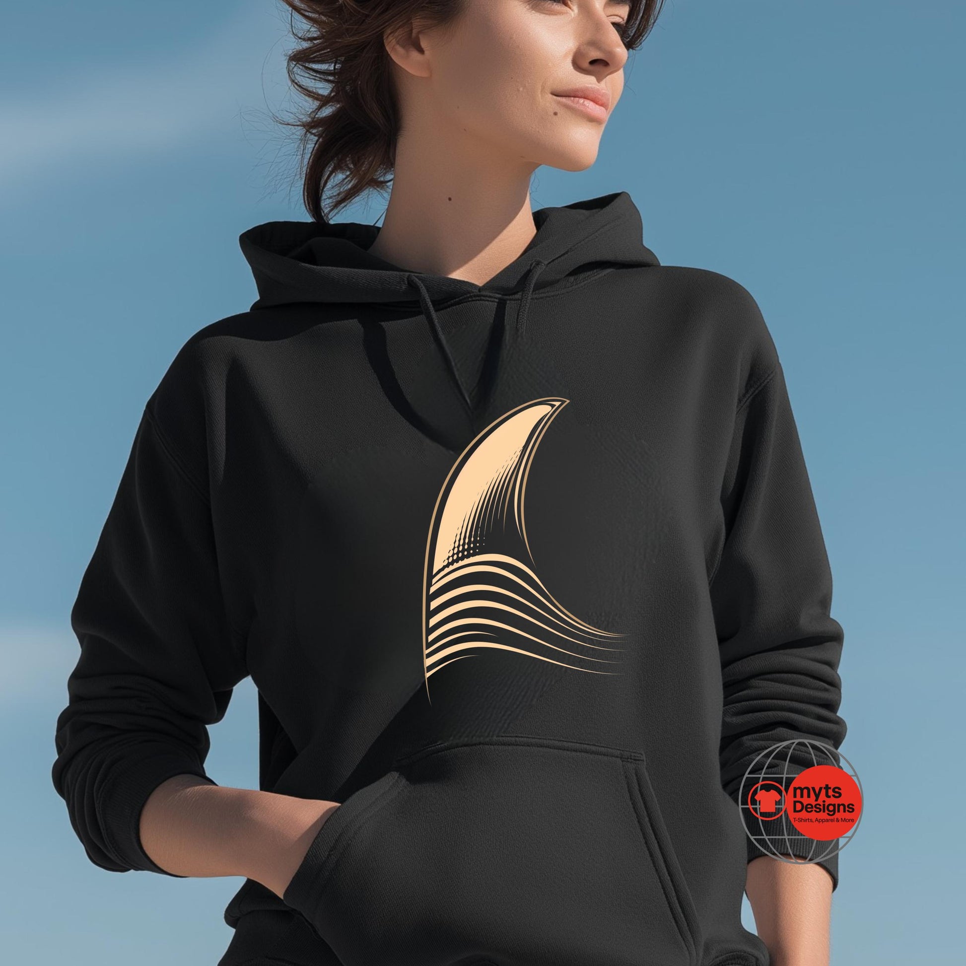 Person wearing a black hoodie with a gold design on a blue background