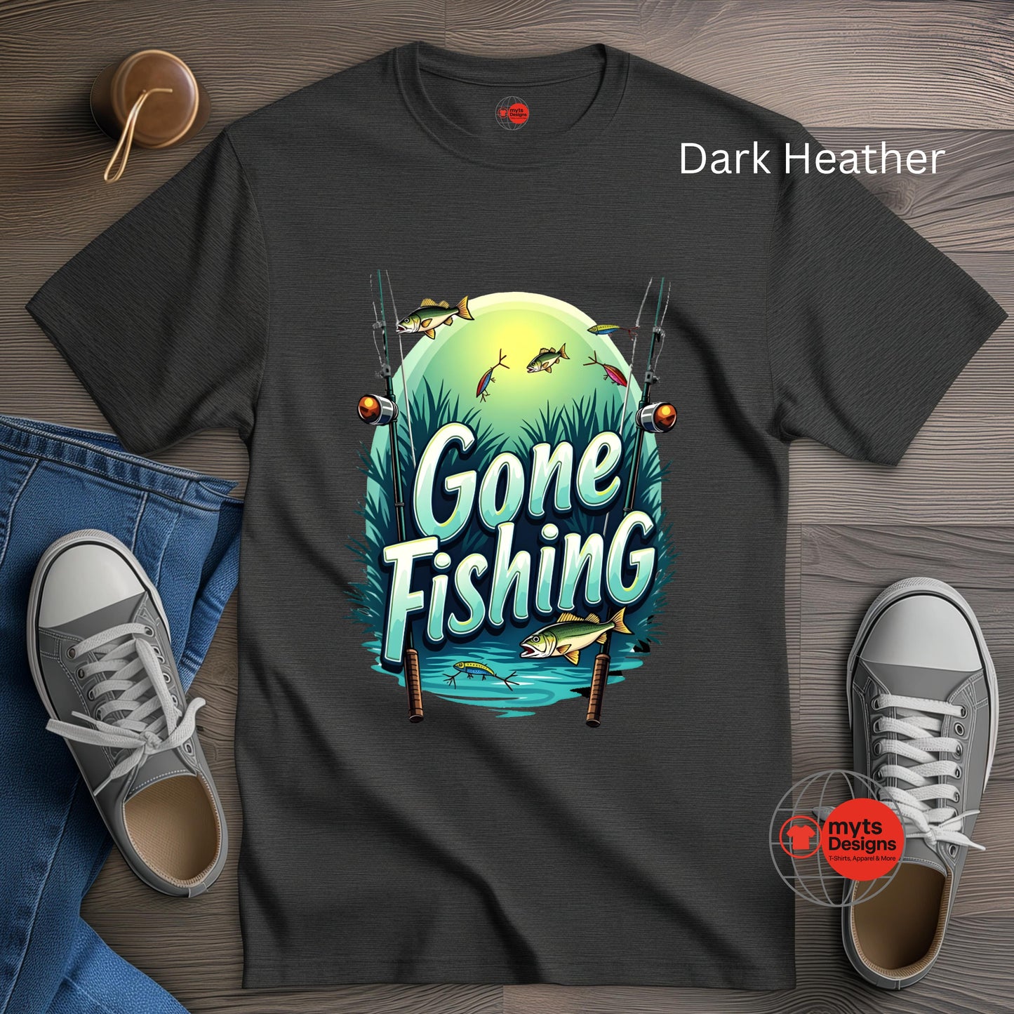 Dark Heather t-shirt with 'Gone Fishing' graphic on a wooden surface with jeans and sneakers.