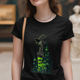 Person wearing a black t-shirt with a witch graphic design.