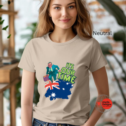 A woman wearing a Neutral t-shirt with a graphic design and text, standing indoors.