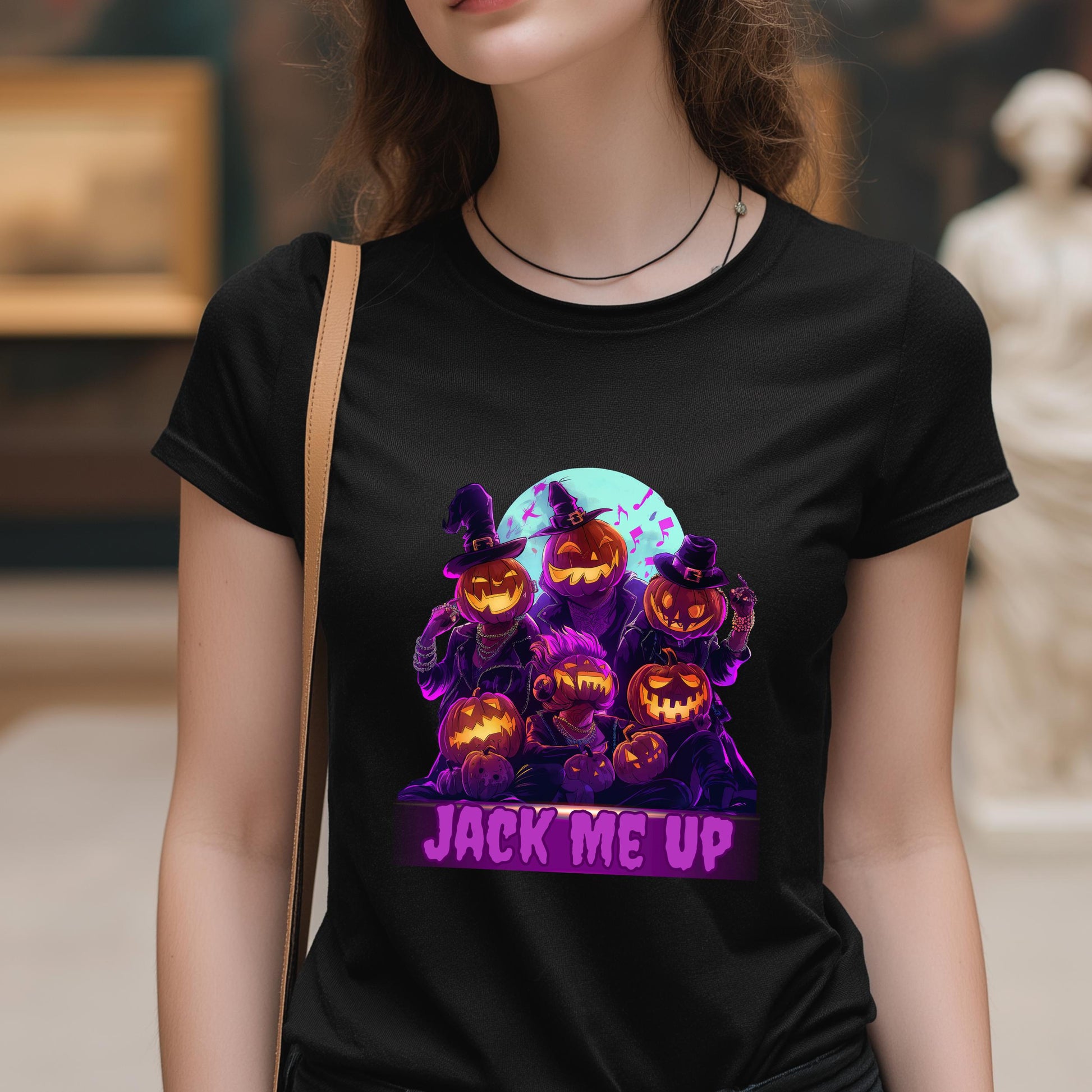 Person wearing a black t-shirt with Halloween-themed design and 'Jack Me Up' text.