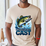 Just One More Cast fishing T-shirt with jumping fish graphic and lure on Natural unisex angler shirt
