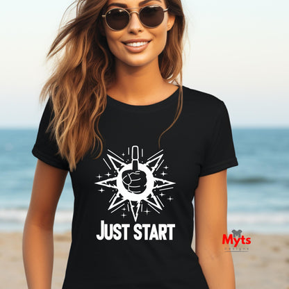Woman wearing a black t-shirt with 'Just Start' design on a beach