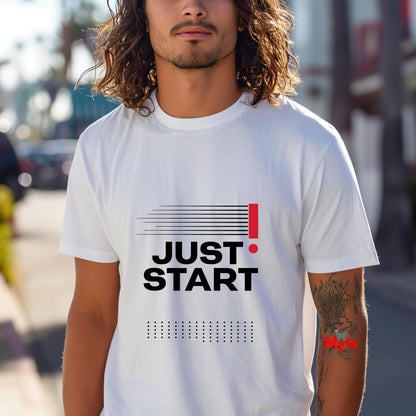 Person wearing a white t-shirt with 'JUST START' text on a street background