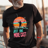 Person wearing a black t-shirt with a fishing graphic and text 'Just One More Cast'.
