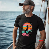 Man on a boat wearing a black t-shirt with a fishing graphic and text.