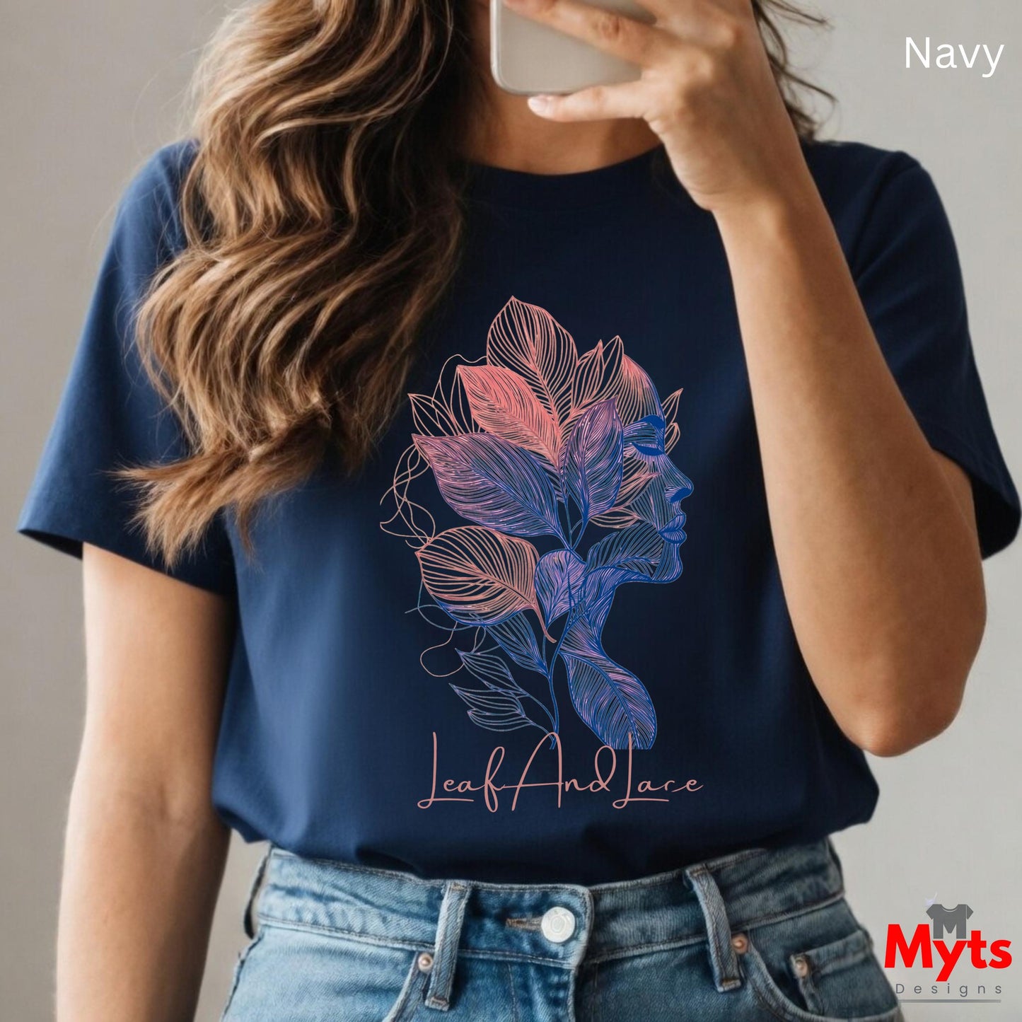 Person wearing a navy t-shirt with floral design and 'Myts' branding.