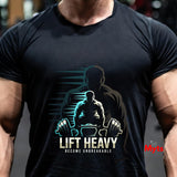 Person wearing a black t-shirt with a 'Lift Heavy' graphic design.